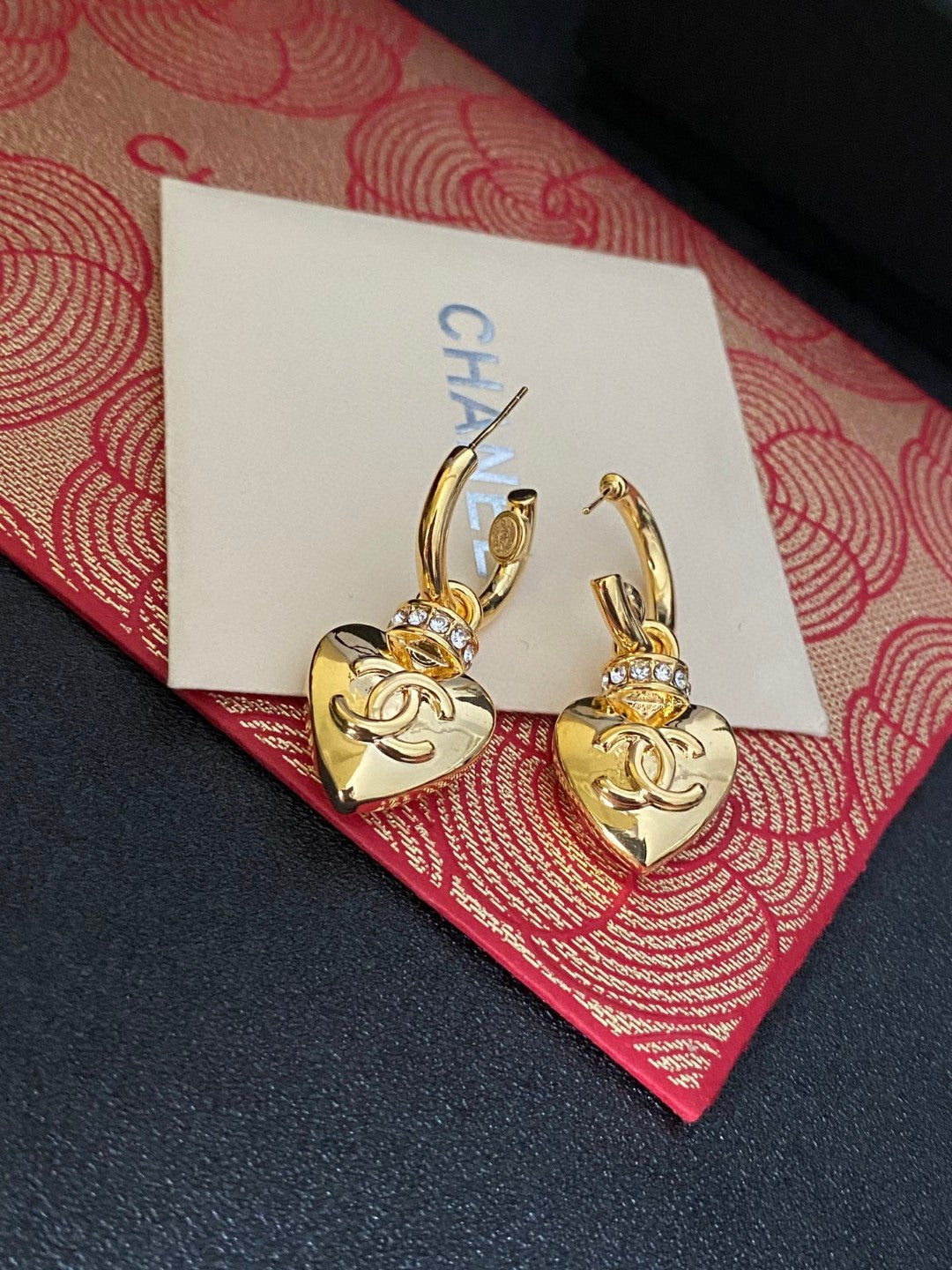 Double-C Emblem Stud Earrings in Polished Metal-Tone – Design 407 styled product view