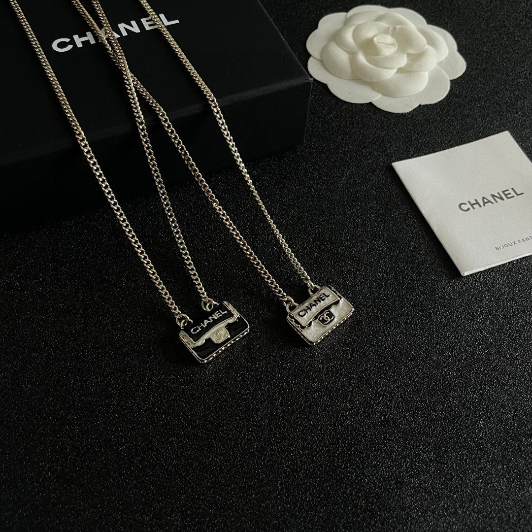 Double-C Emblem Pendant Necklace in Polished Metal-Tone – Design 056 detail view