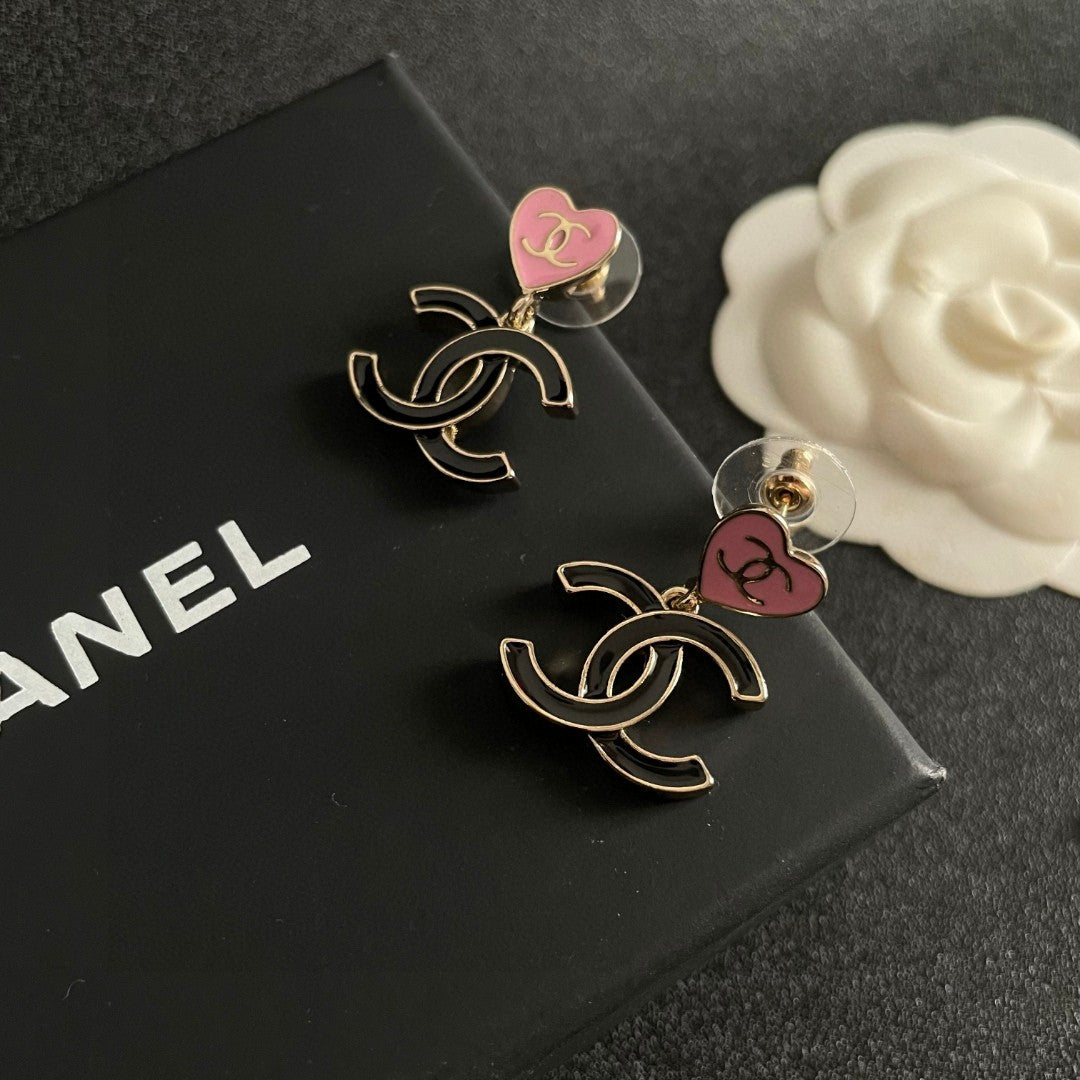 Double-C Emblem Statement Earrings in Polished Metal-Tone – Heart Detail detail view