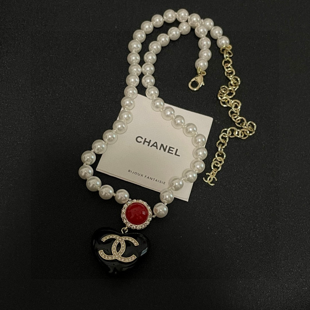 Double-C Emblem Crystal-Accent Pendant Necklace – Heart Detail – Design 002 detail view