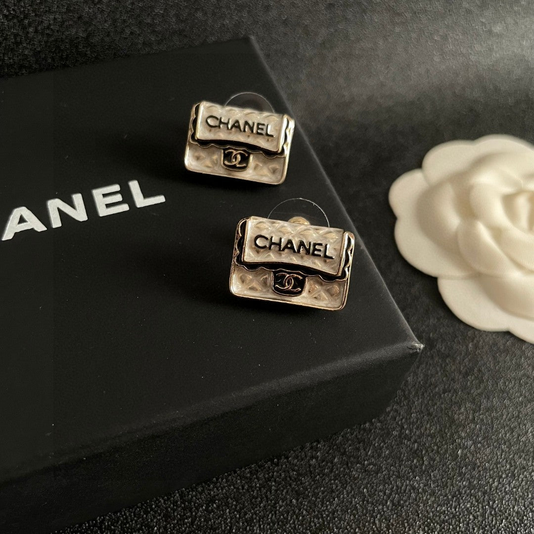 Double-C Emblem Stud Earrings in Polished Metal-Tone – Design 152 detail view