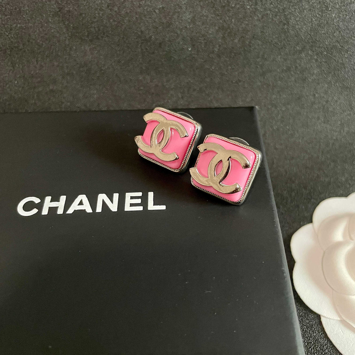Double-C Emblem Stud Earrings in Polished Metal-Tone – Design 190 detail view