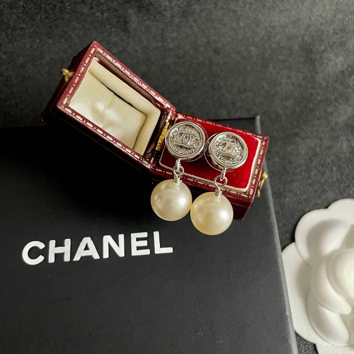 Signature Emblem Stud Earrings in Polished Metal-Tone – Design 040 detail view