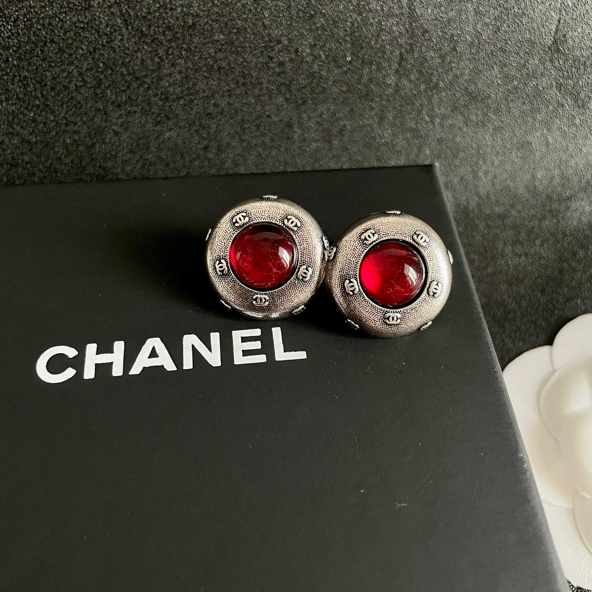 Double-C Emblem Stud Earrings in Polished Metal-Tone – Design 170 detail view
