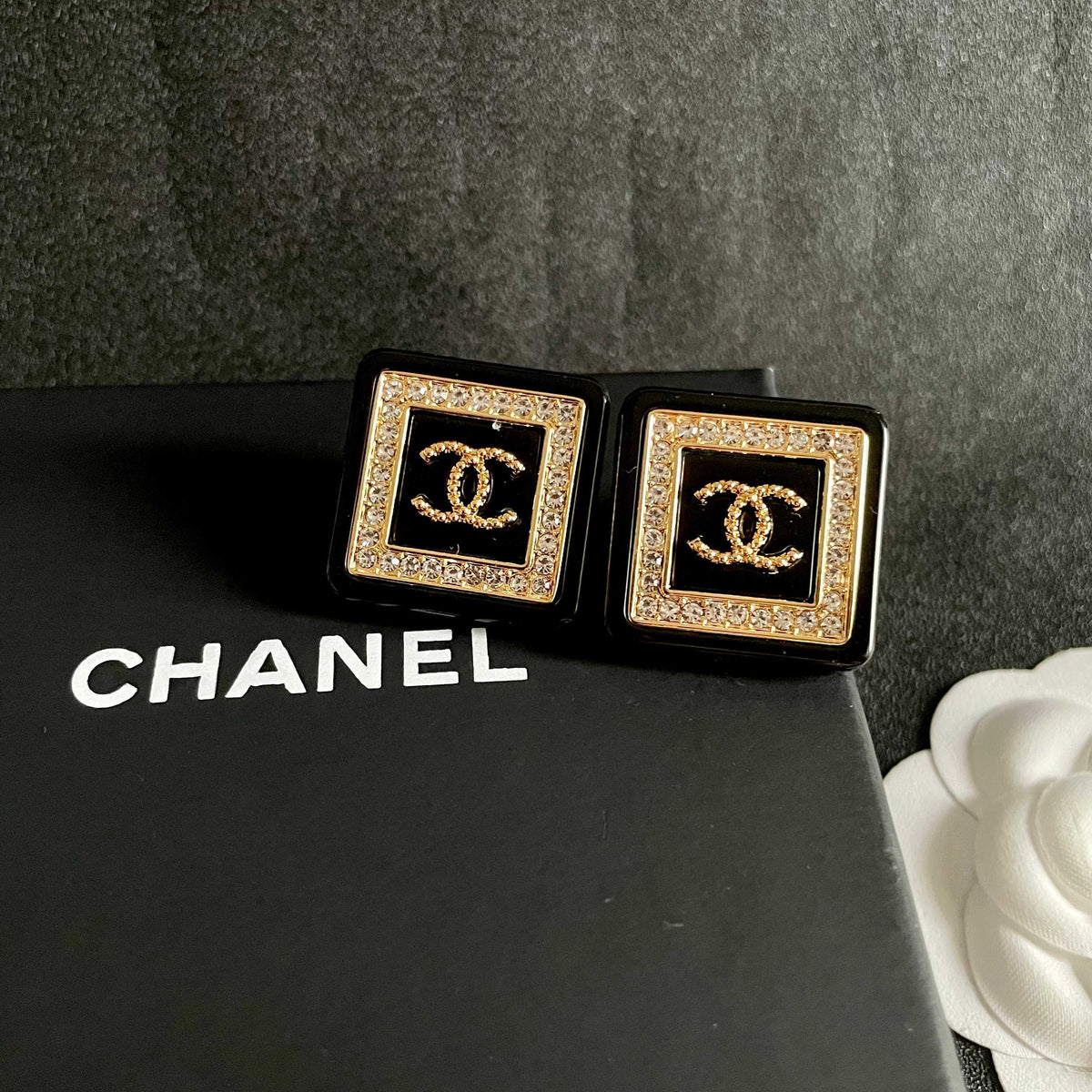Double-C Emblem Stud Earrings in Polished Metal-Tone – Design 304 detail view