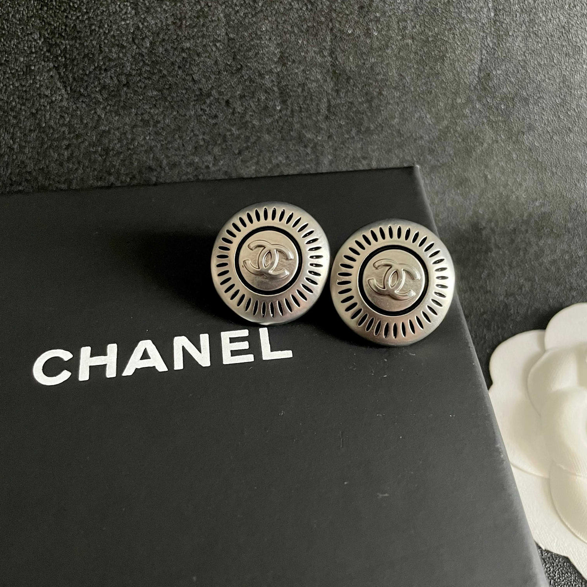 Double-C Emblem Stud Earrings in Polished Metal-Tone – Design 116 detail view