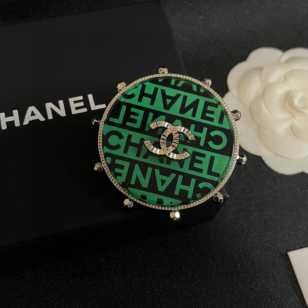 Double-C Emblem Brooch in Polished Metal-Tone – Design 009 detail view