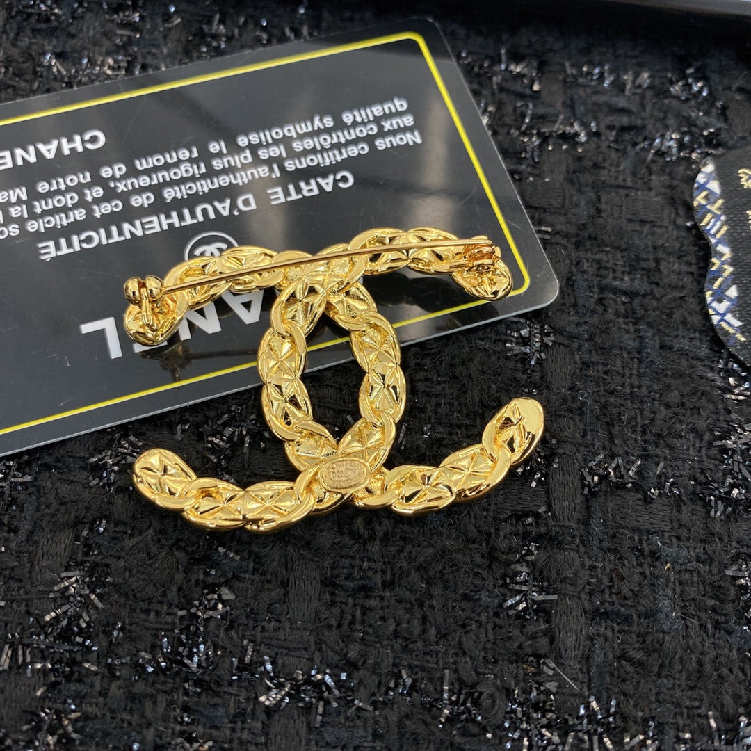 Signature Emblem Brooch in Polished Metal-Tone – Design 057 front product view