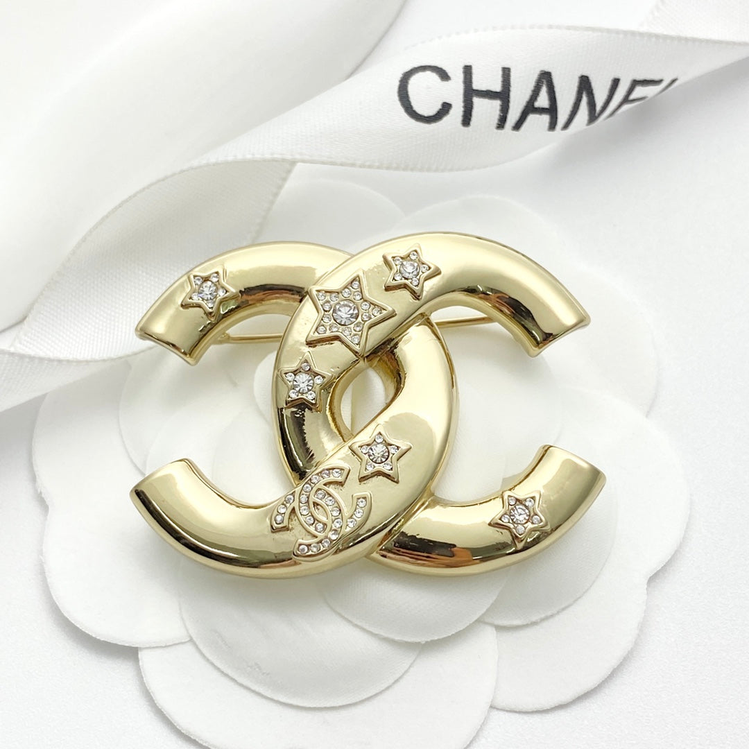 Double-C Emblem Brooch in Gold-Tone – Star Detail main product view