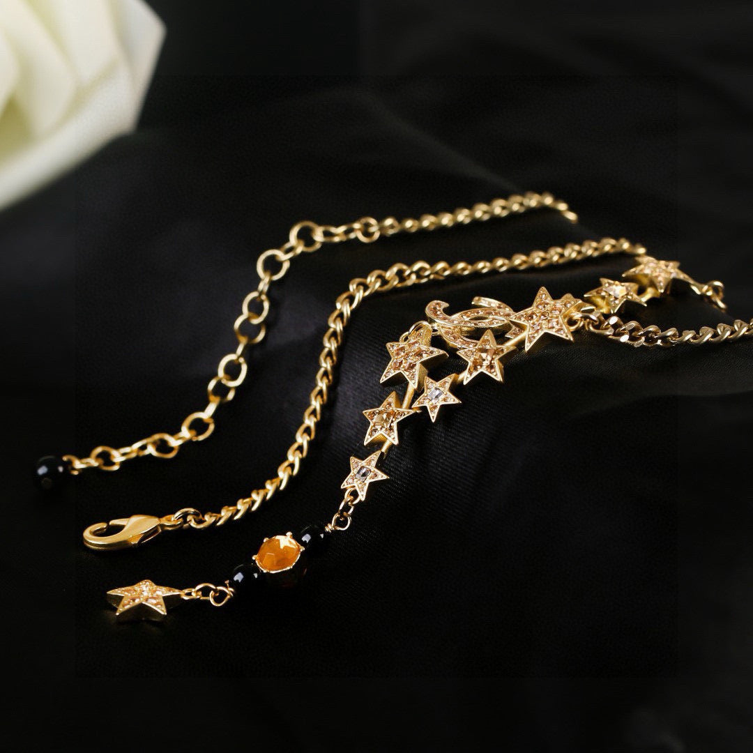Signature Emblem Pendant Necklace in Polished Metal-Tone – White Detail styled product view