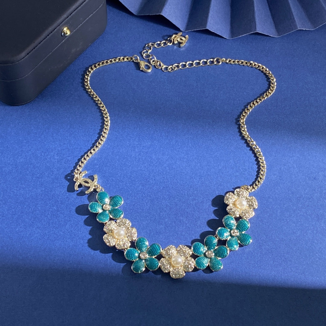 Double-C Emblem Pearl-Detail Pendant Necklace – Pearl Detail – Design 112 detail view