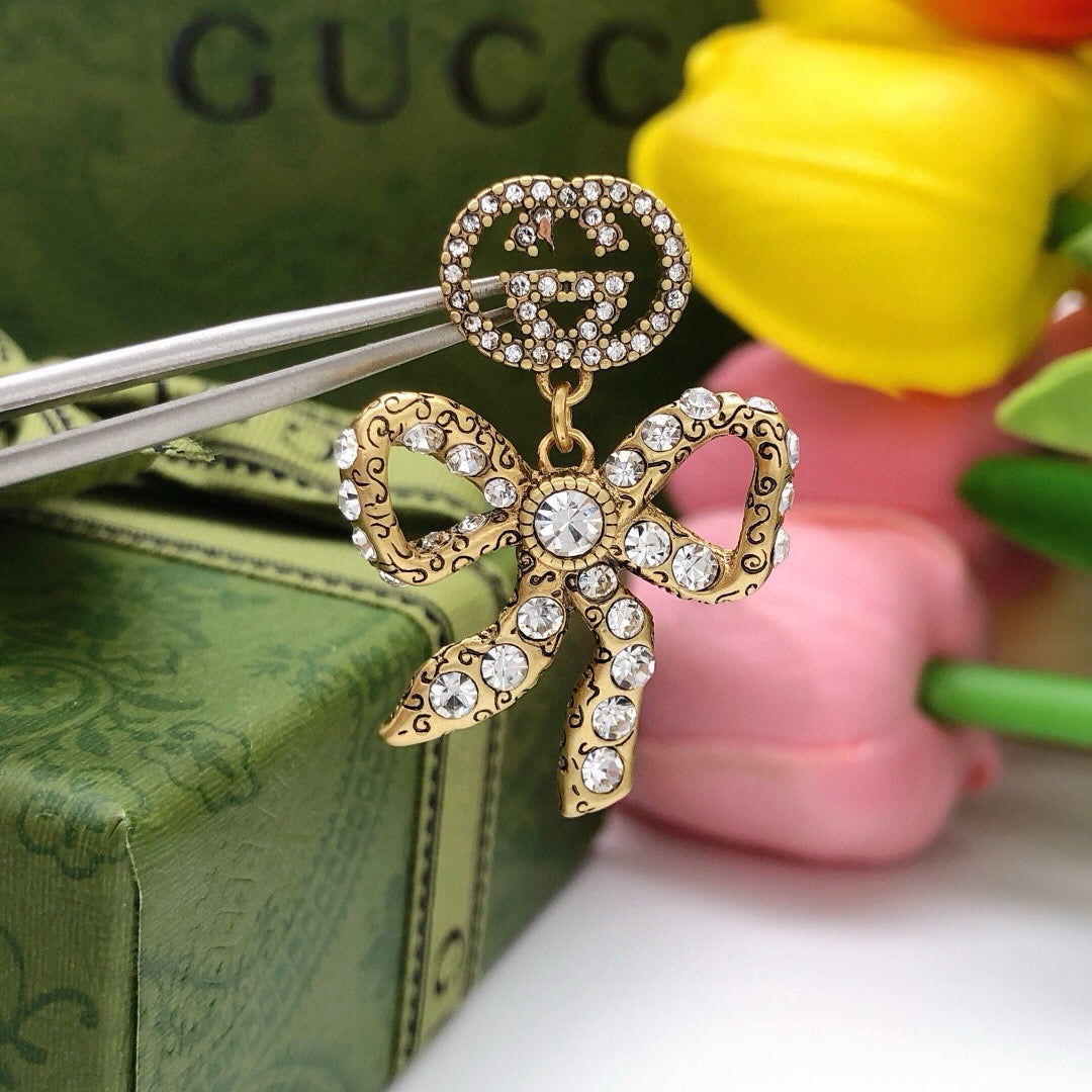 Double-G Emblem Statement Earrings in Polished Metal-Tone – Design 001 styled product view