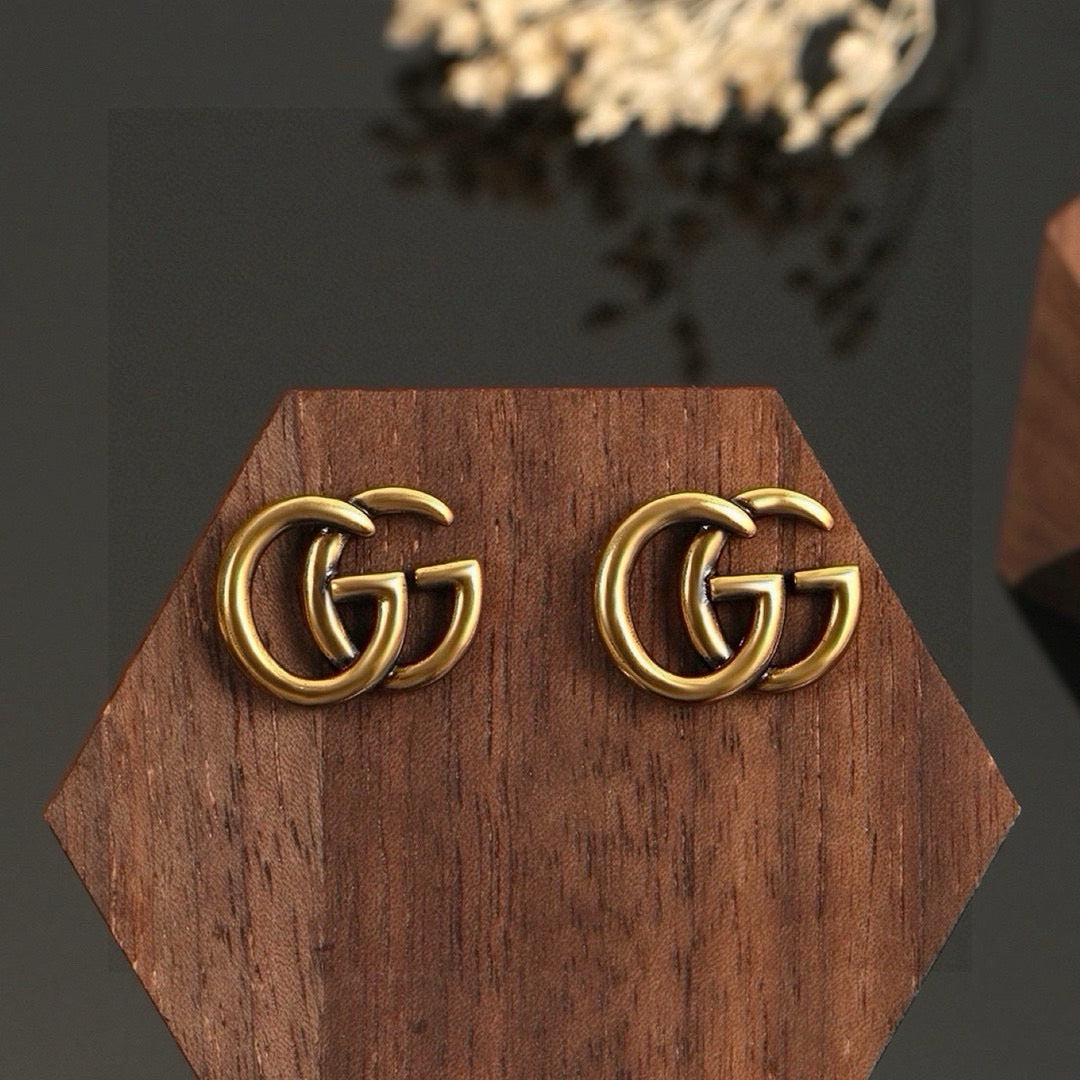 Geometric Emblem Stud Earrings in Polished Metal-Tone – Design 044 front product view