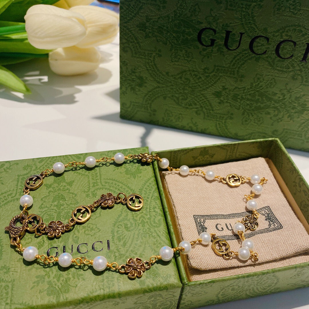 Letter Emblem Pendant Necklace in Polished Metal-Tone – Vintage Detail detail view