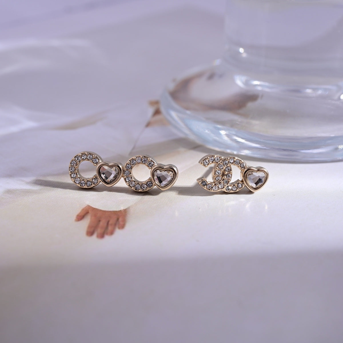 Signature Emblem Stud Earrings in Polished Metal-Tone – Design 113 styled product view