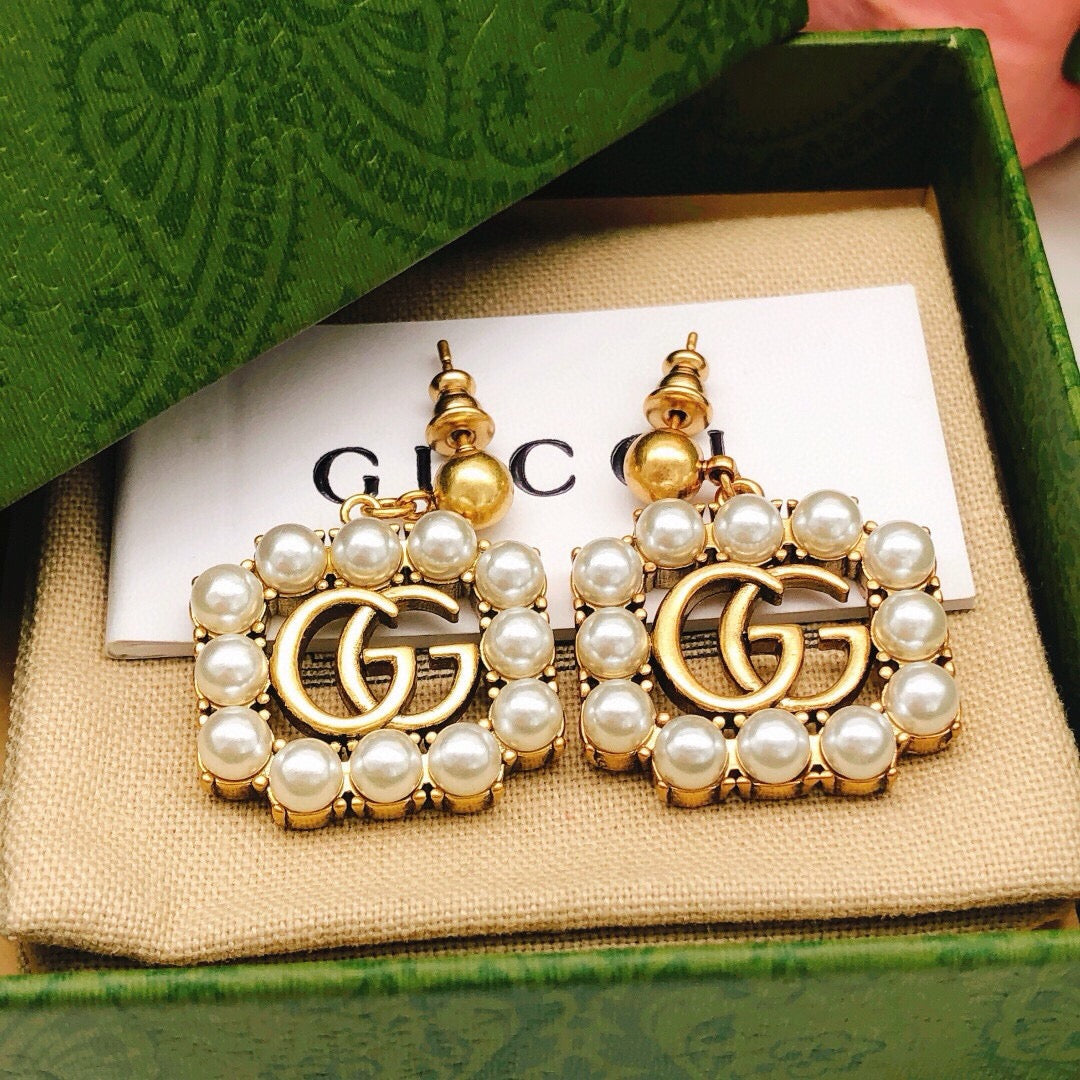 Geometric Emblem Stud Earrings in Polished Metal-Tone – Design 050 front product view
