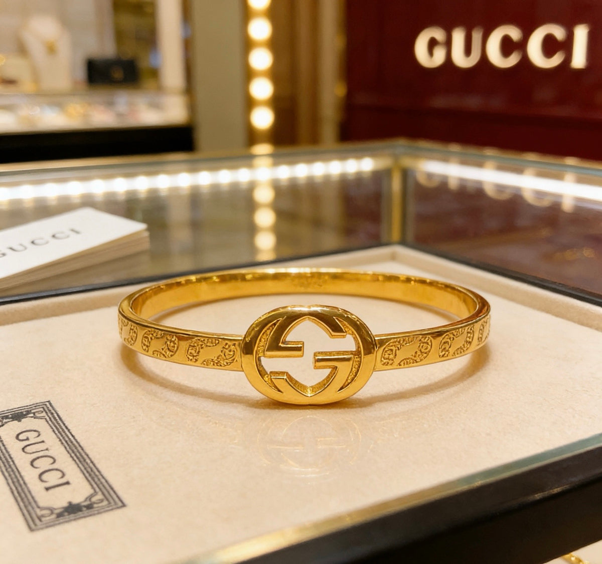 Double-G Emblem Bangle in Polished Metal-Tone – Design 004 detail view