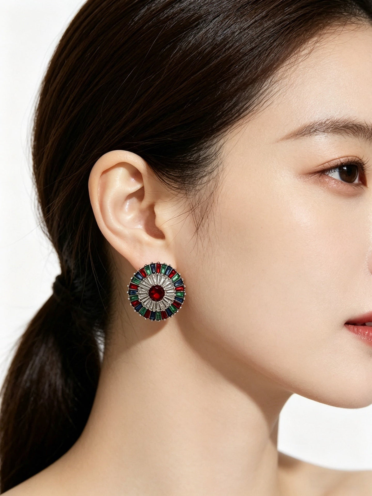 Martin Graham stud earrings in polished metal-tone – side detail