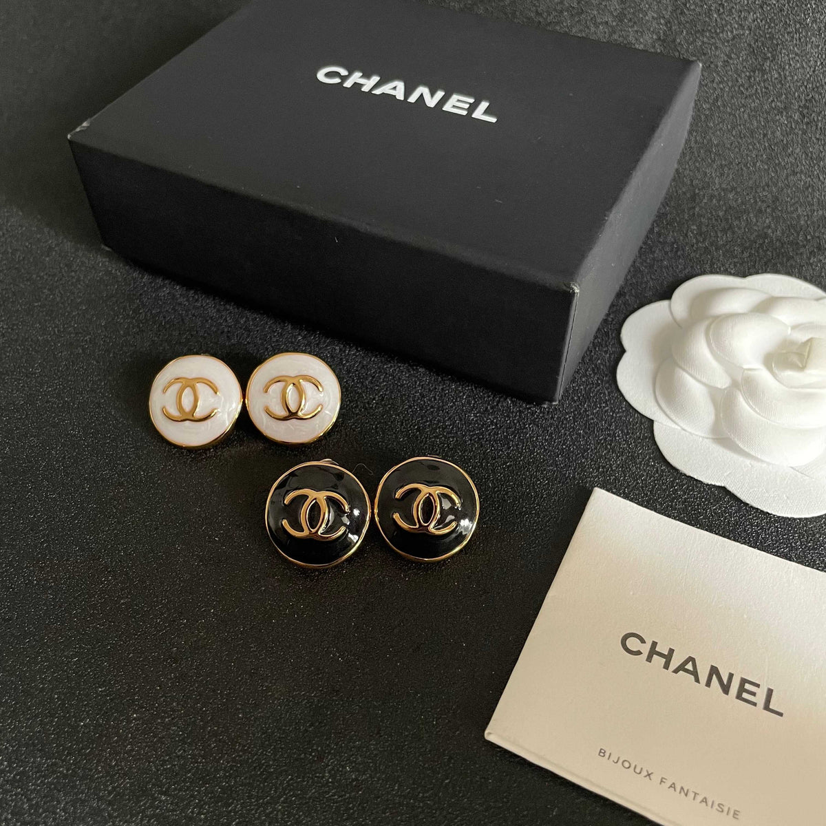Martin Graham stud earrings in polished metal-tone – side detail