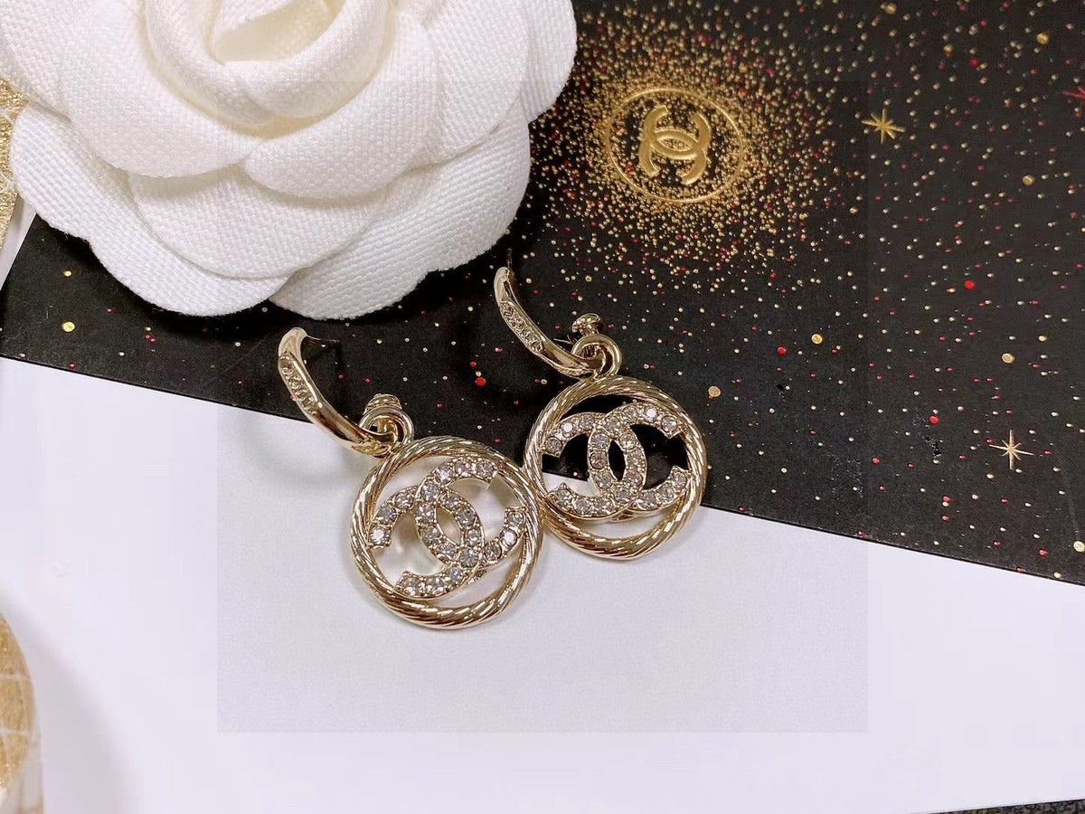 Martin Graham stud earrings in polished metal-tone – main product view