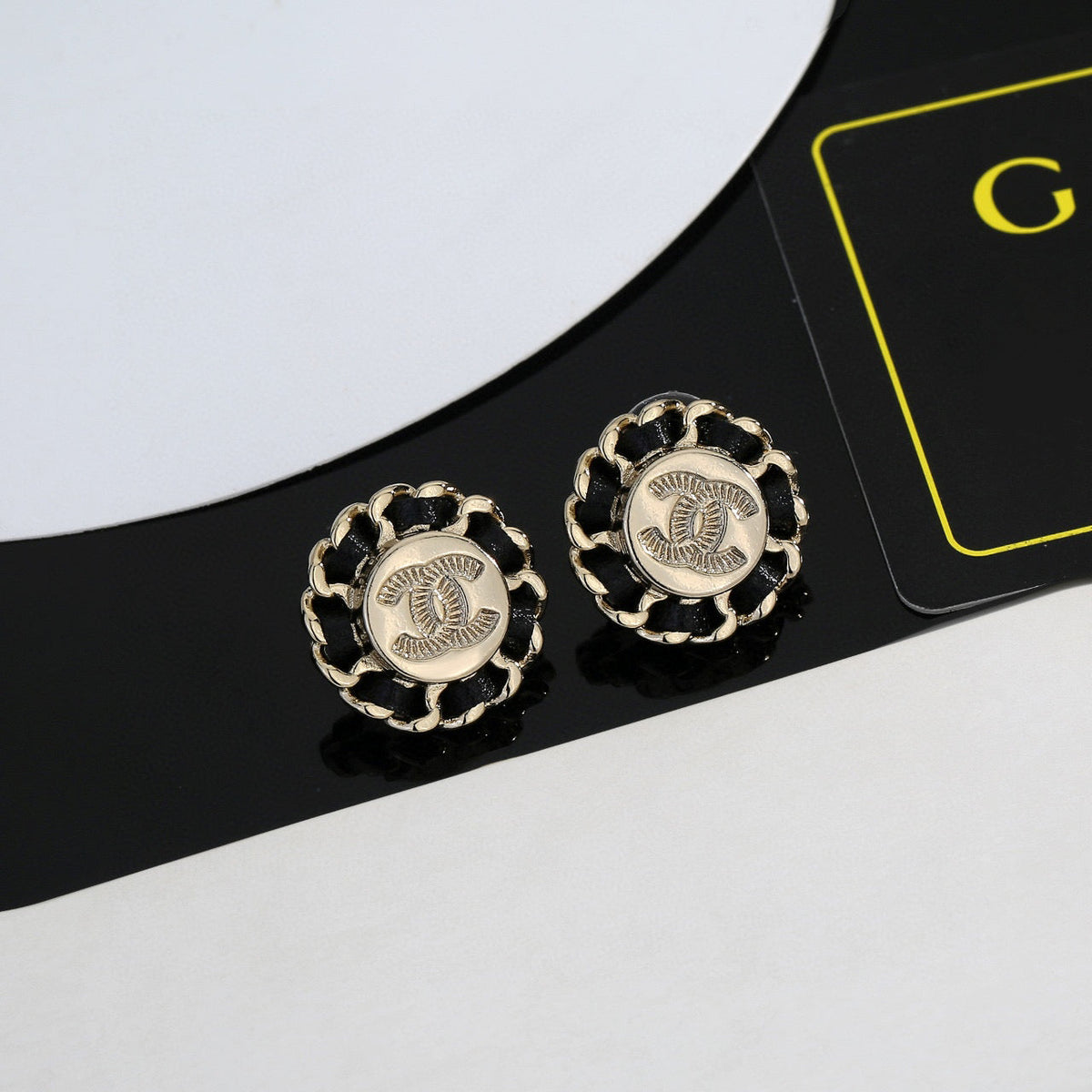 Martin Graham stud earrings in polished metal-tone – main product view