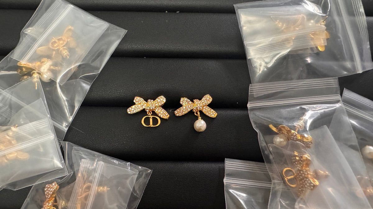 Martin Graham stud earrings in polished metal-tone – main product view