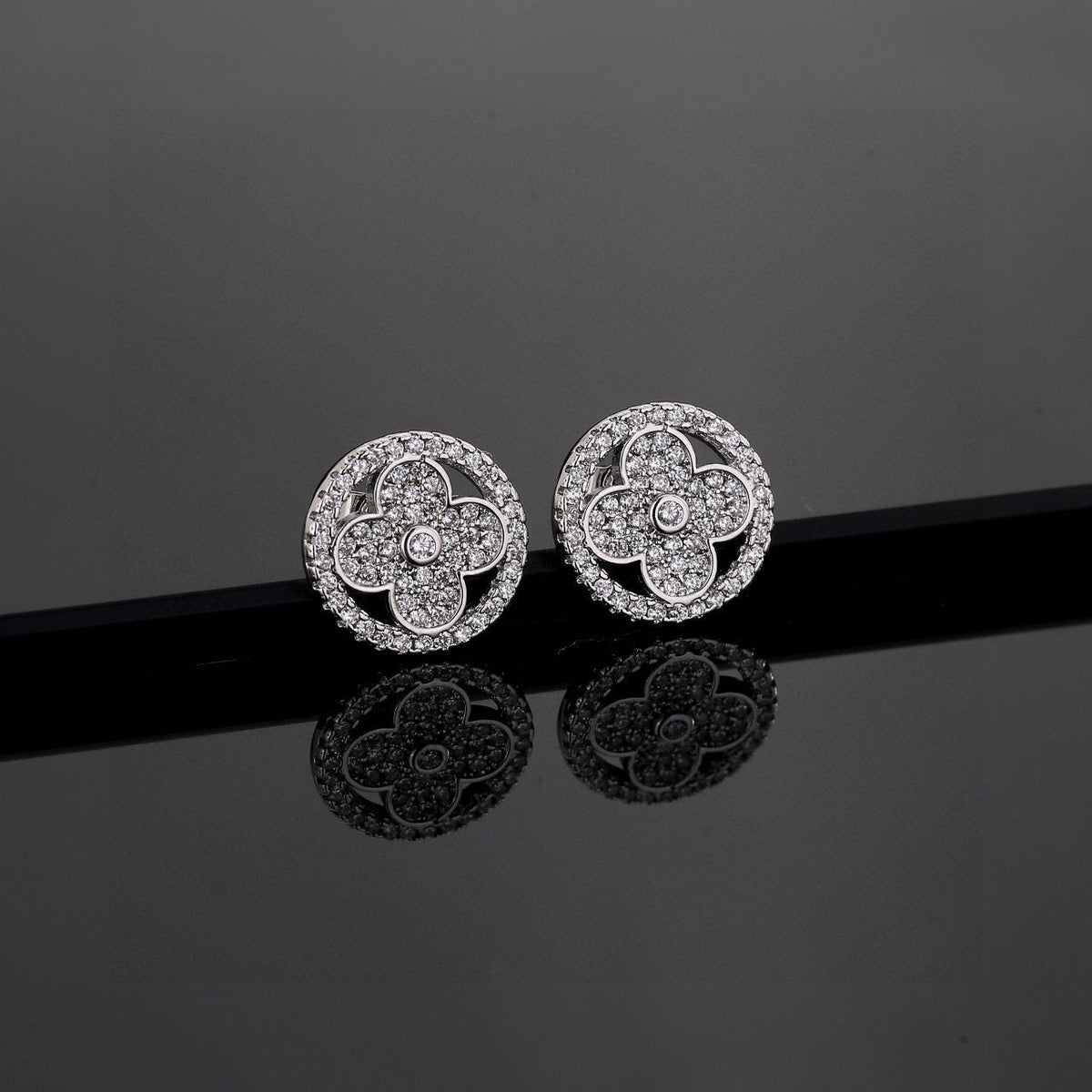 Martin Graham stud earrings in polished metal-tone – main product view