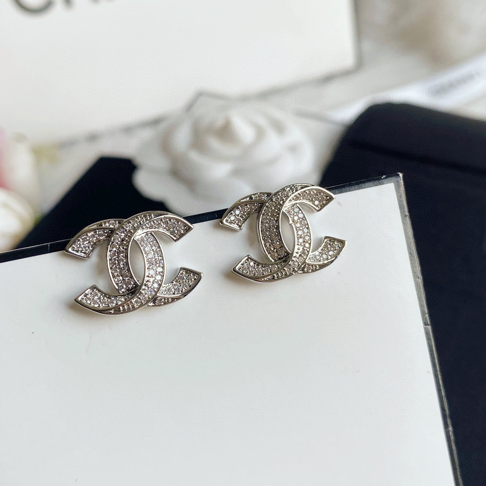 Martin Graham stud earrings in polished metal-tone – main product view