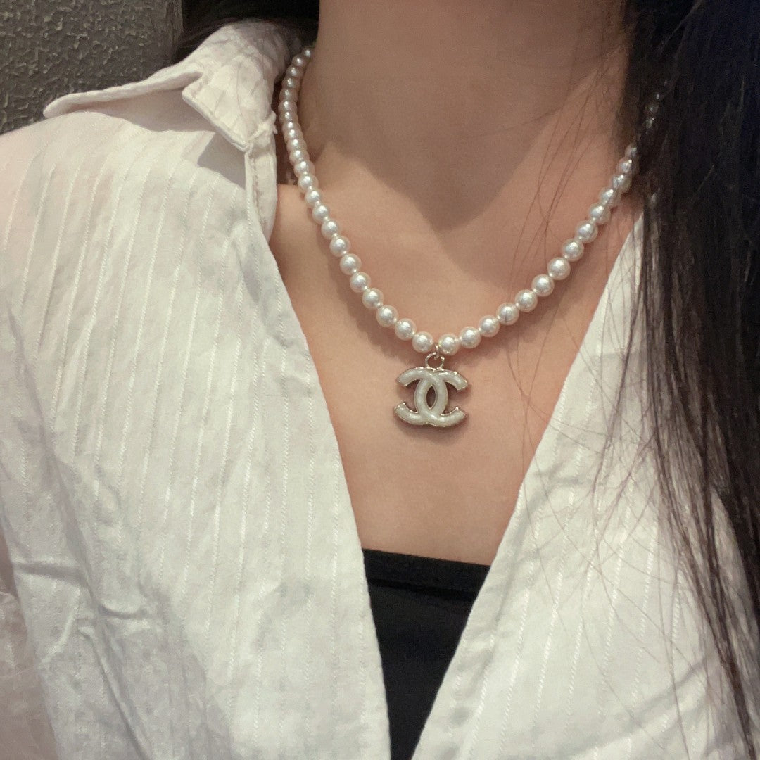Martin Graham pendant necklace in polished metal-tone – main product view