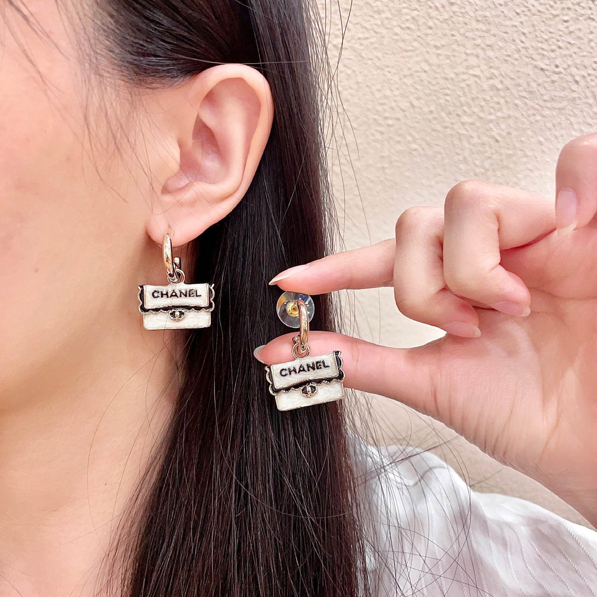 Martin Graham stud earrings in polished metal-tone – main product view