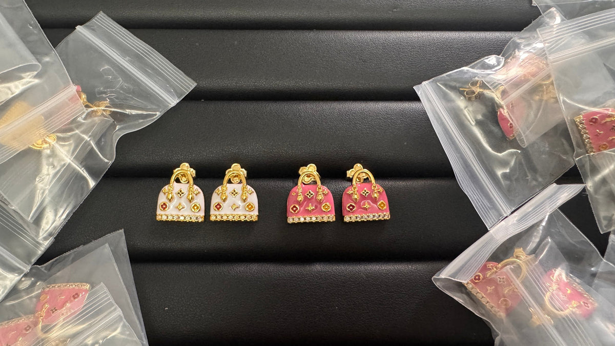 Martin Graham stud earrings in polished metal-tone – main product view