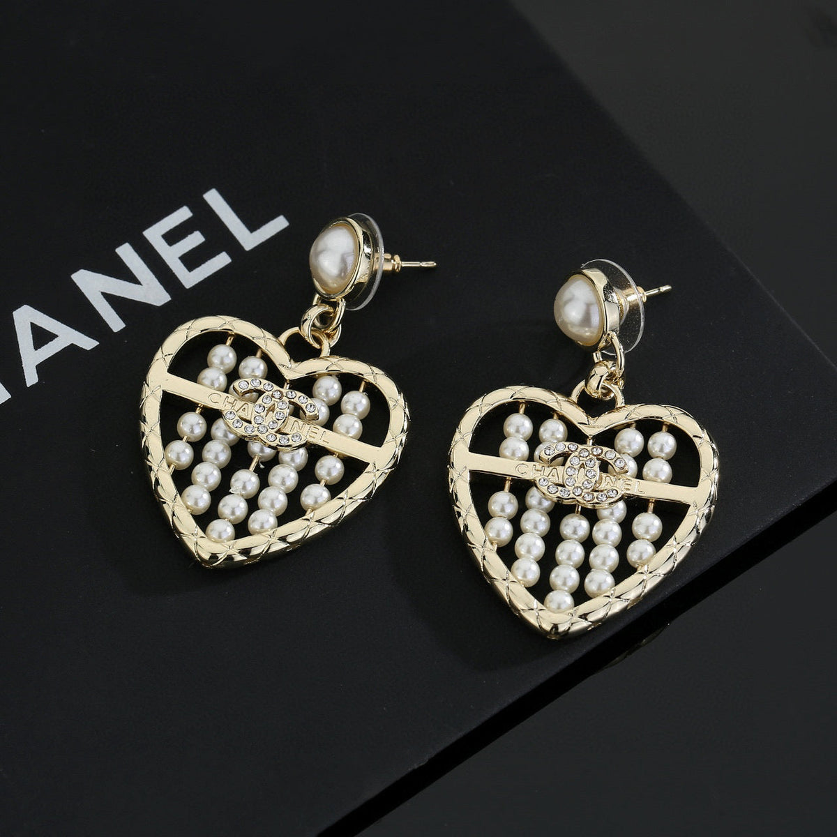 Martin Graham stud earrings in polished metal-tone – main product view