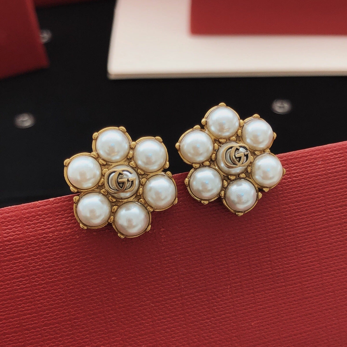 Martin Graham stud earrings in polished metal-tone – main product view