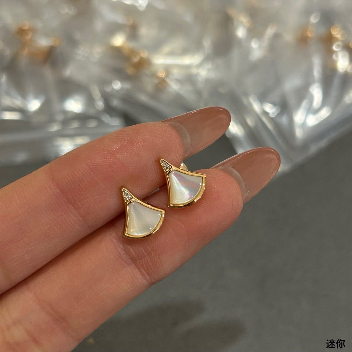 Martin Graham stud earrings in polished metal-tone – main product view