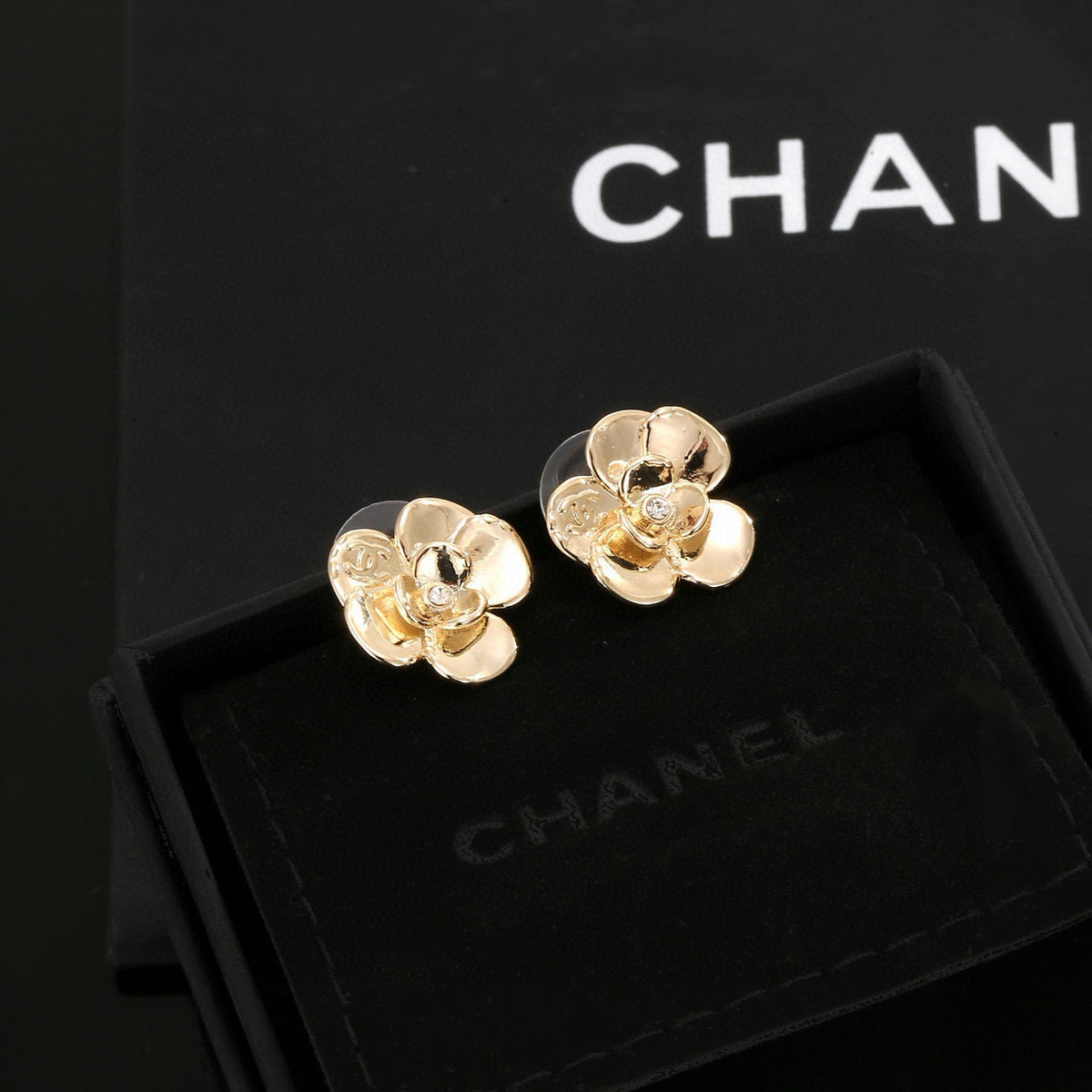 Martin Graham stud earrings in polished metal-tone – main product view