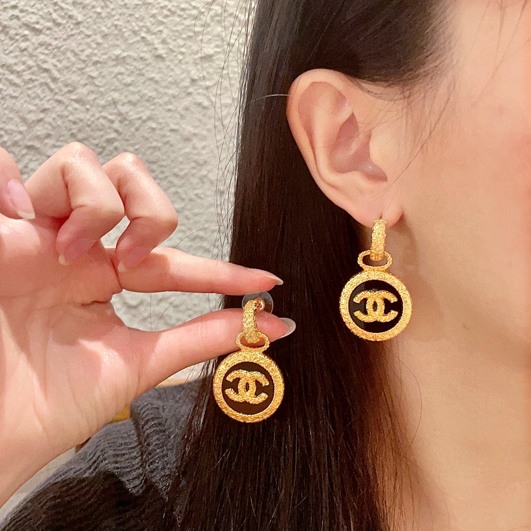 Martin Graham stud earrings in polished metal-tone – main product view