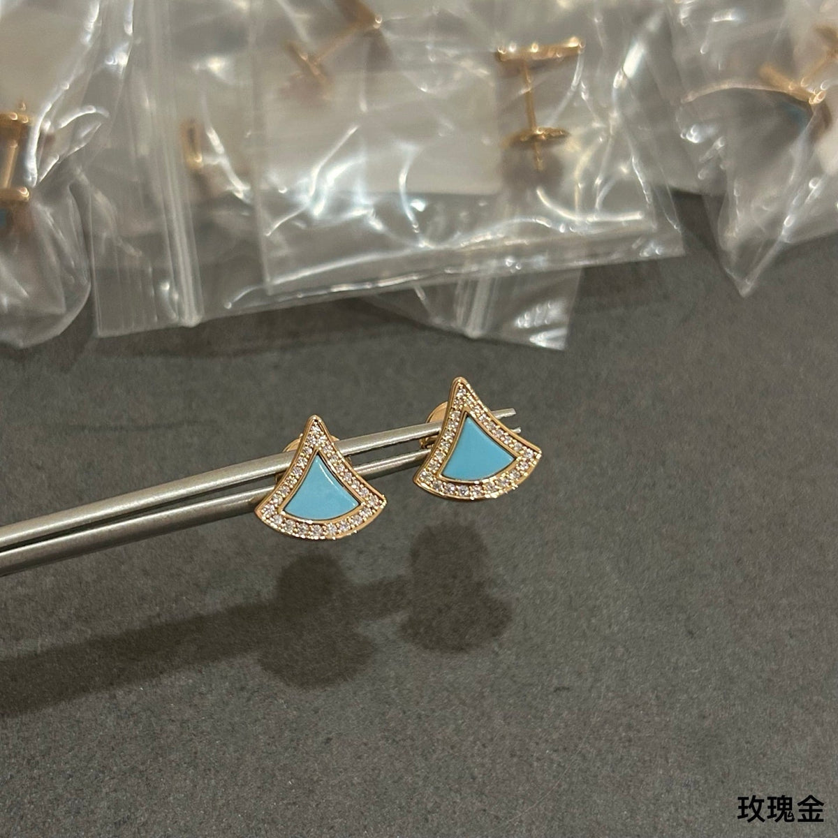 Martin Graham stud earrings in polished metal-tone – main product view