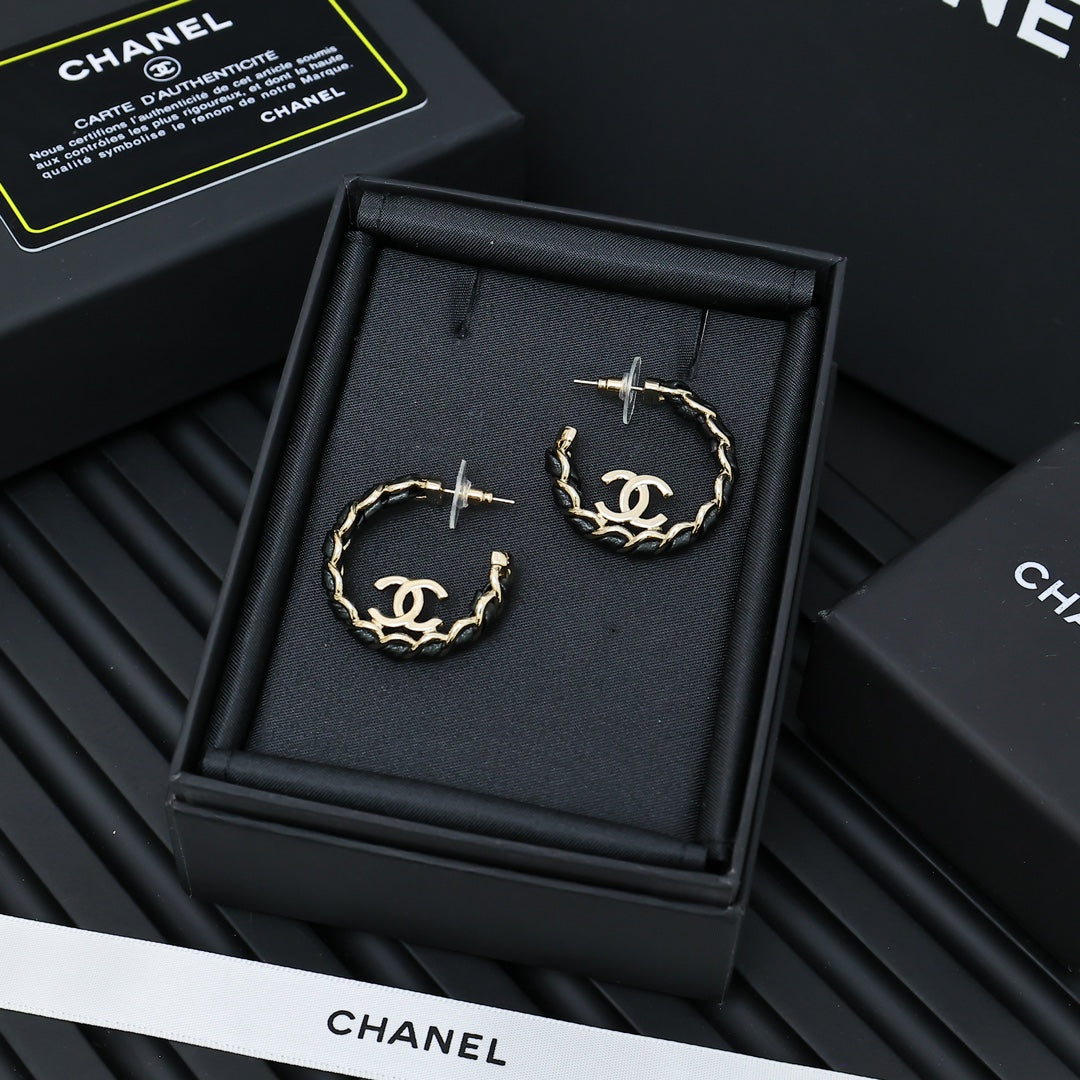 Martin Graham earrings in polished metal-tone – main product view