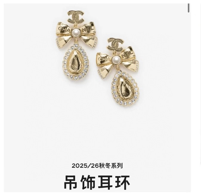 Martin Graham stud earrings in polished metal-tone – main product view