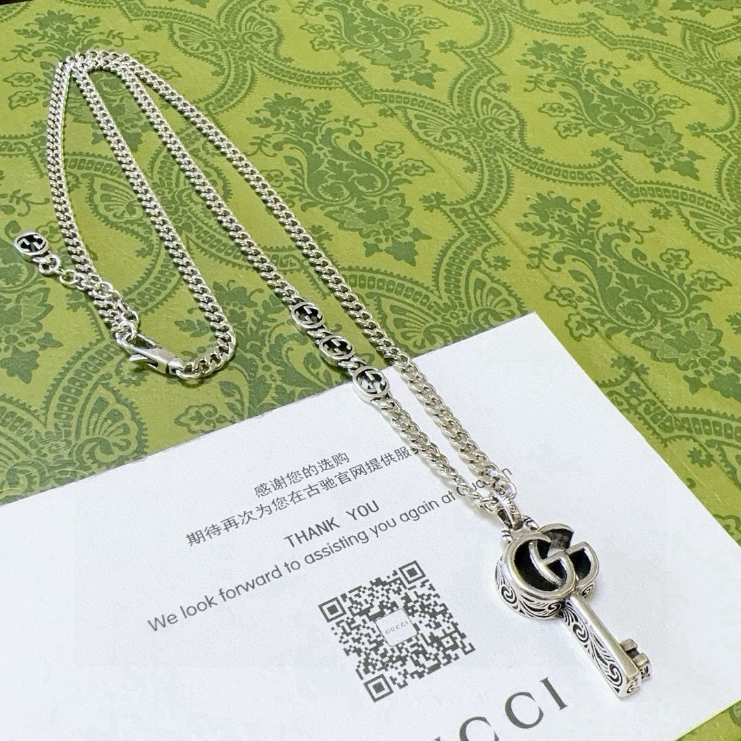 Martin Graham pendant necklace in polished metal-tone – main product view