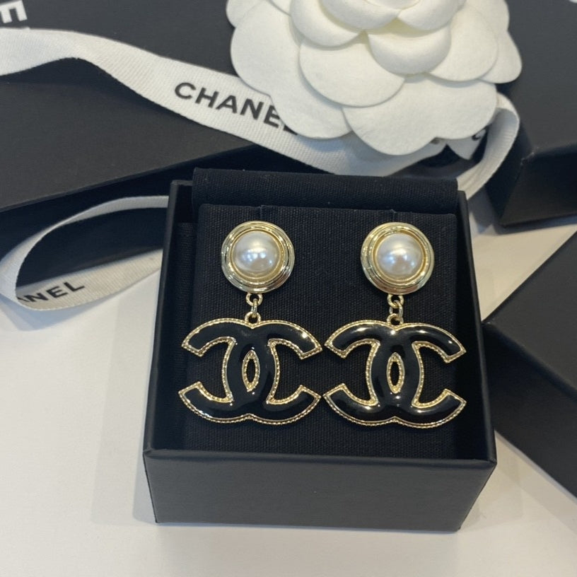 Martin Graham Letter stud earrings in polished metal-tone – main product view