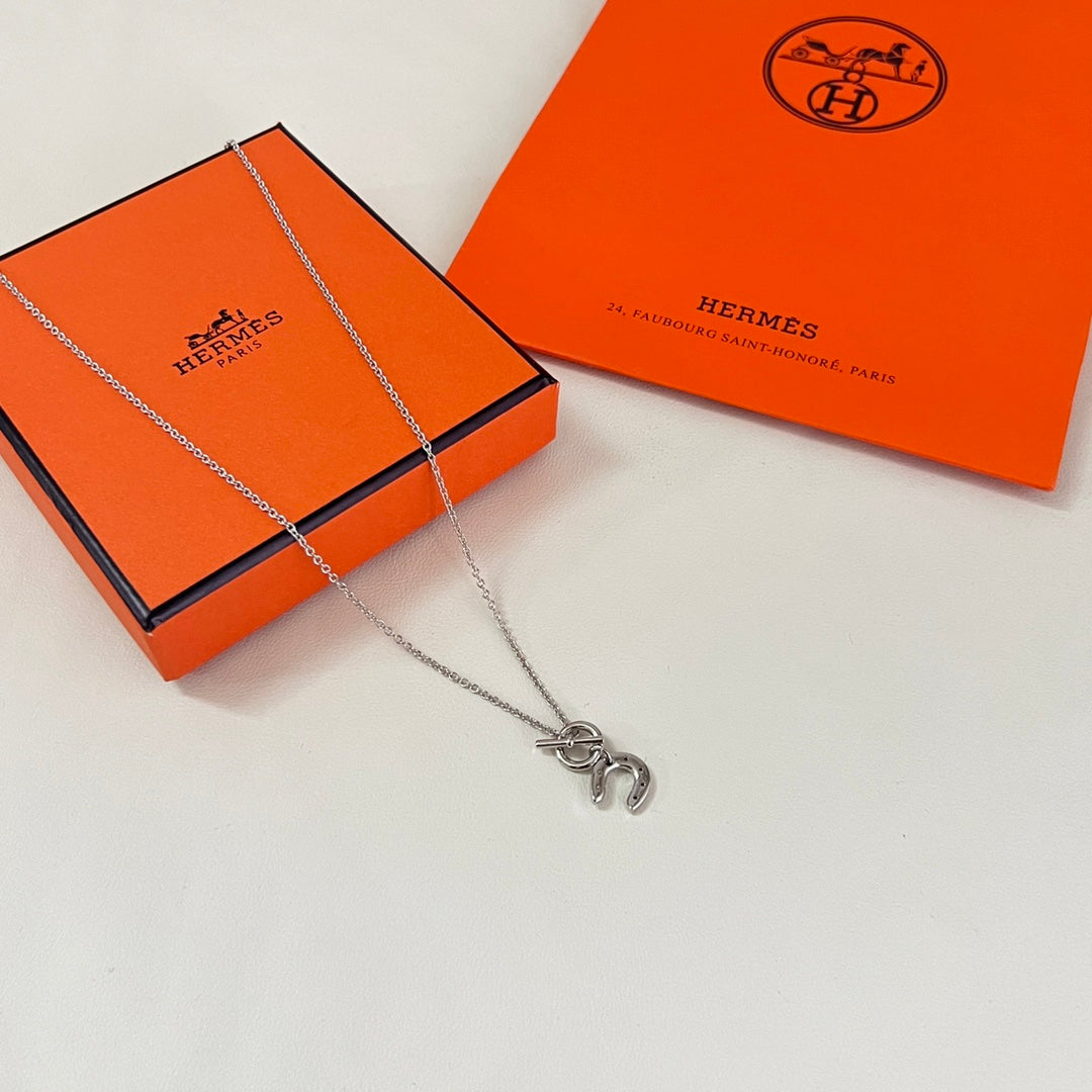 Martin Graham pendant necklace in polished metal-tone – main product view