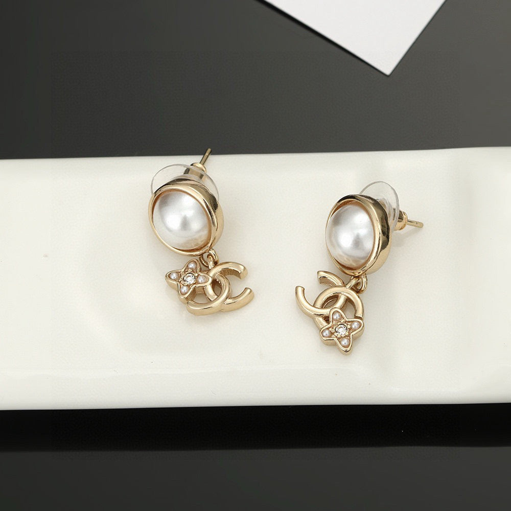 Martin Graham stud earrings in polished metal-tone – main product view