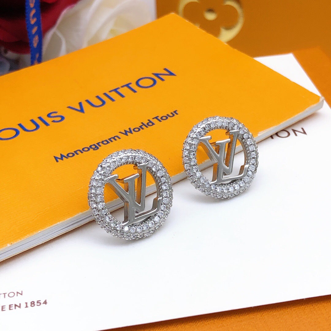 Martin Graham stud earrings in polished metal-tone – main product view