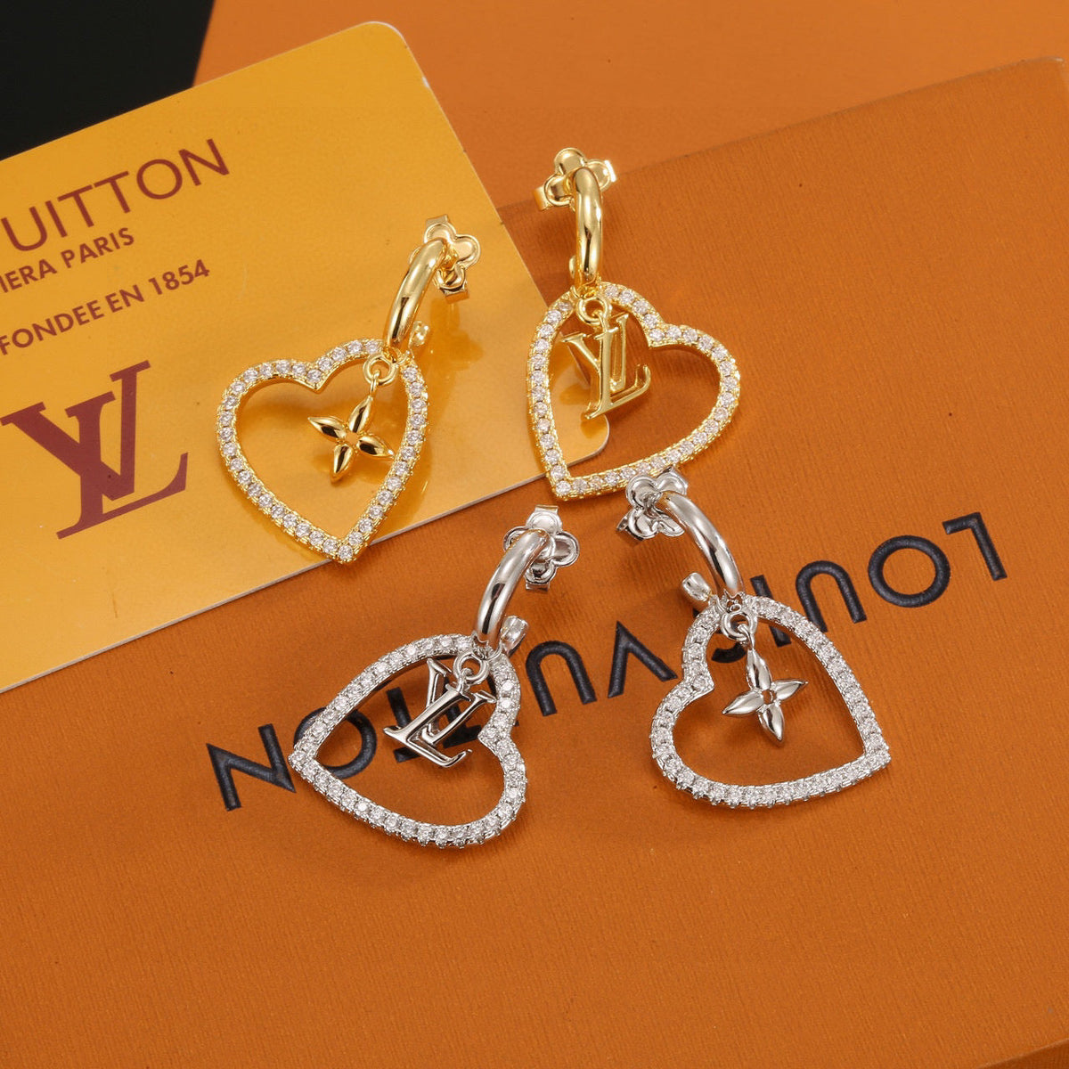 Martin Graham stud earrings in polished metal-tone – main product view