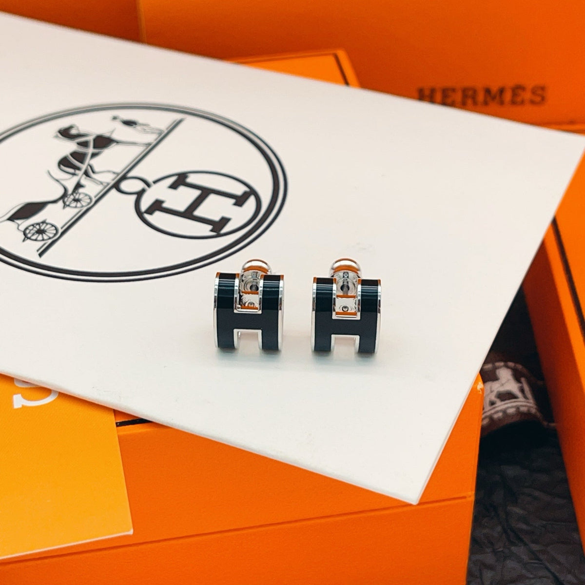 Martin Graham stud earrings in polished metal-tone – main product view