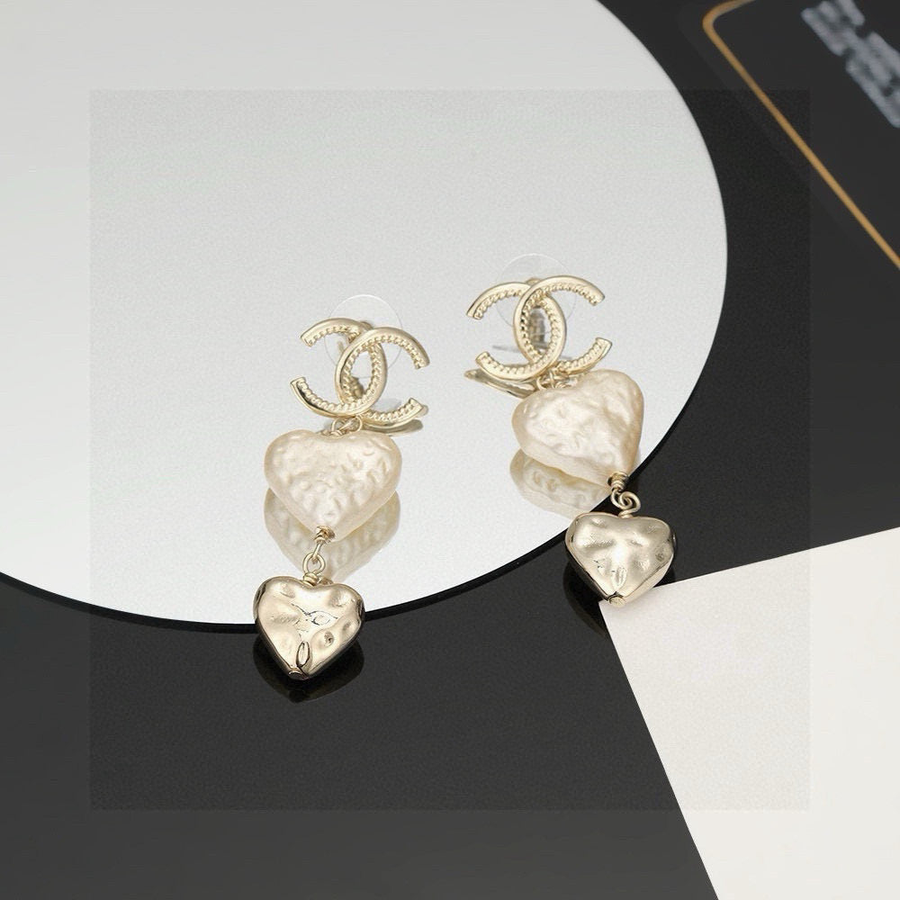 Martin Graham stud earrings in polished metal-tone – main product view