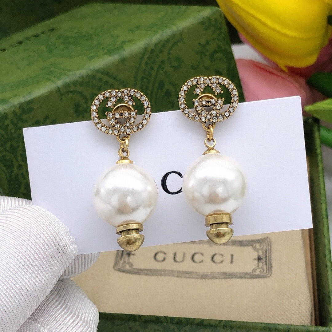 Martin Graham stud earrings in polished metal-tone – main product view