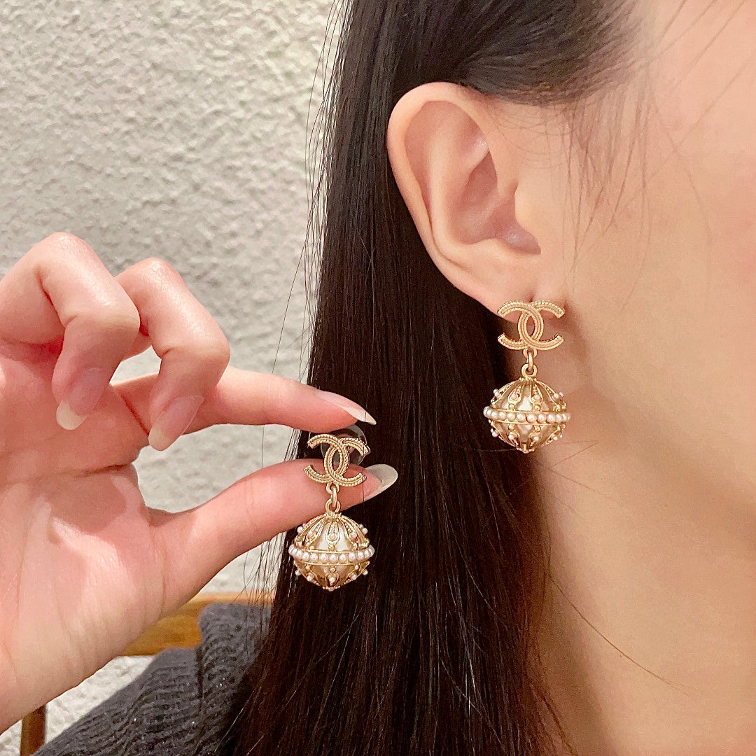 Martin Graham stud earrings in polished metal-tone – main product view