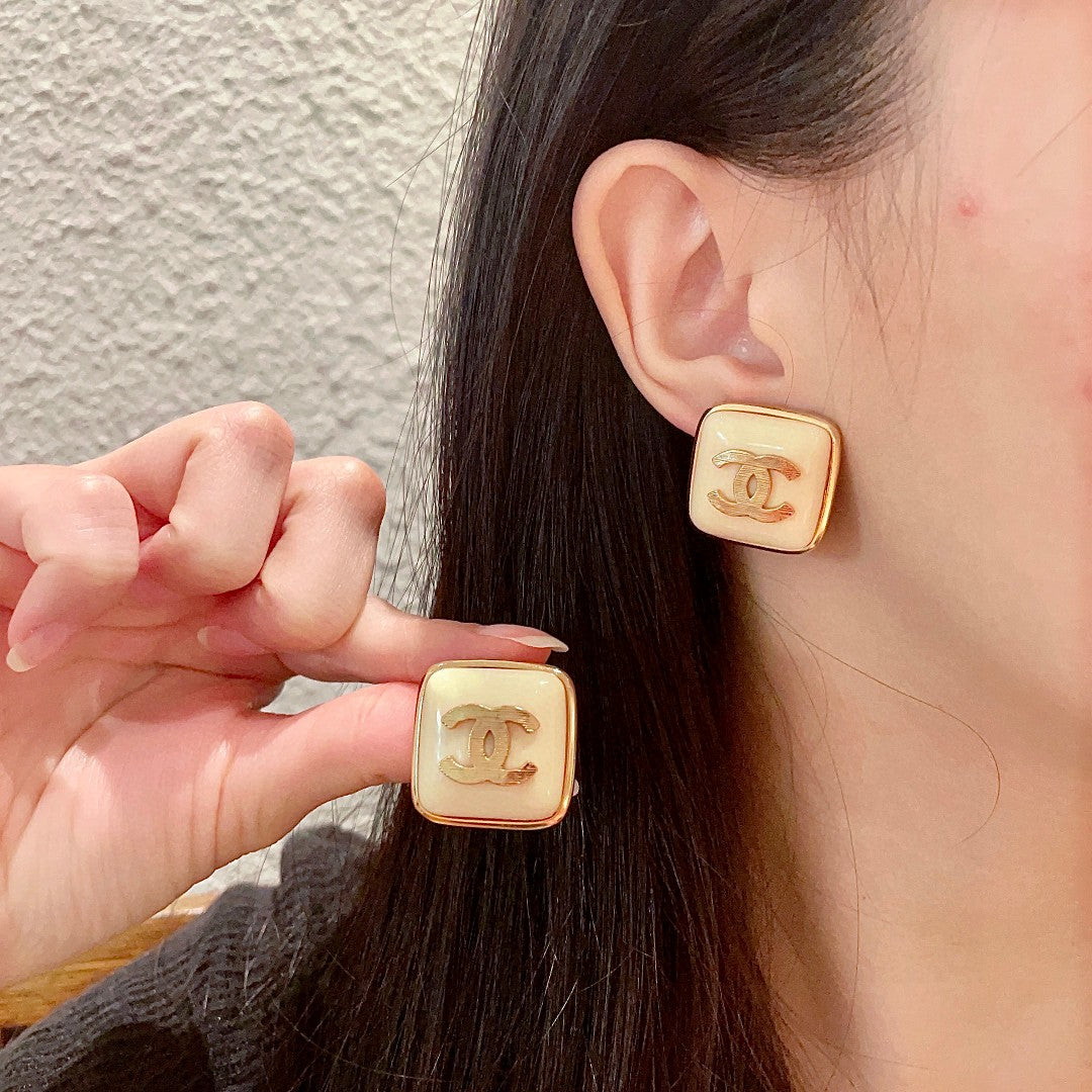 Martin Graham stud earrings in polished metal-tone – main product view